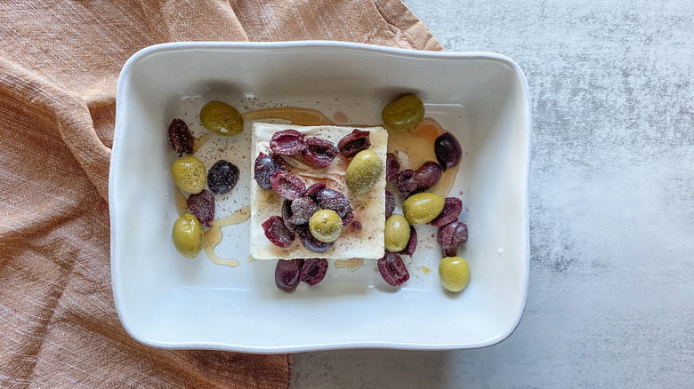 feta and olives in baking dish