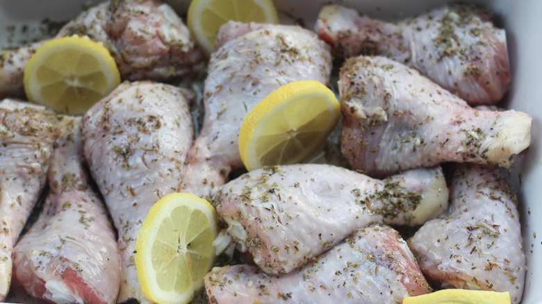 Lemon slices nestled among chicken