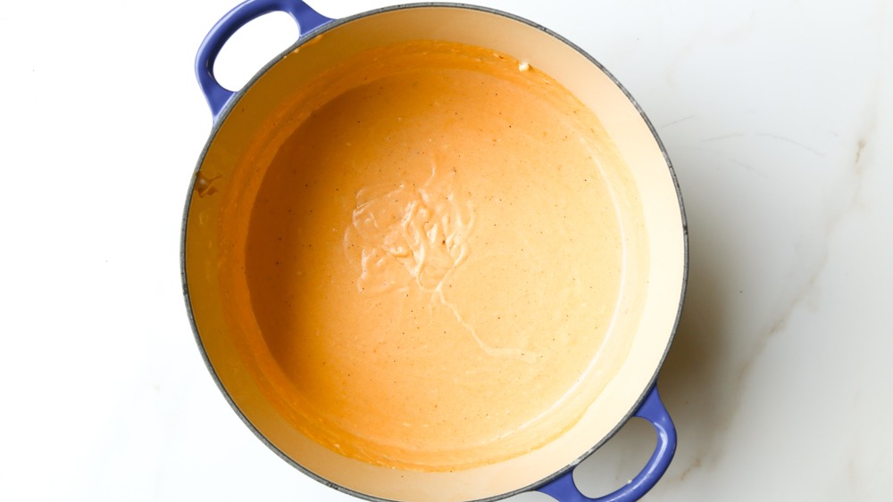 cheese sauce in pot for baked mac and cheese