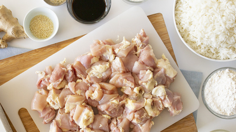 cut-up chicken on cutting board