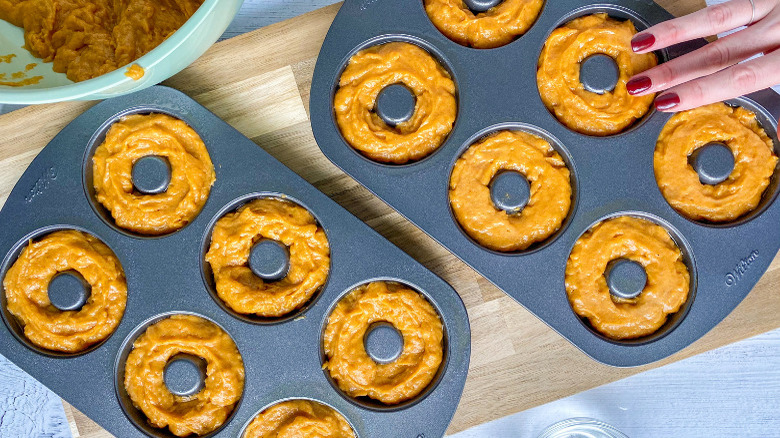 pumpkin donut batter in tin