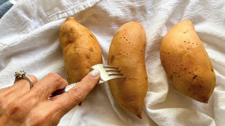 poke sweet potatoes with fork