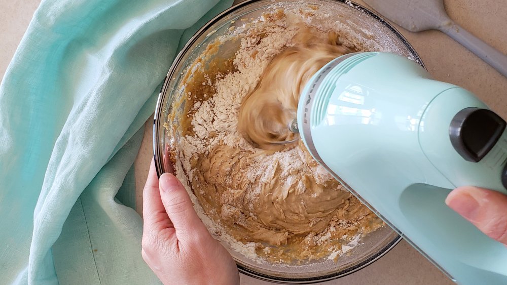 mixing banana bread