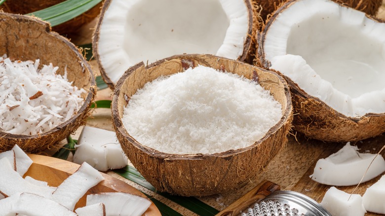 Shredded coconut in coconut bowl