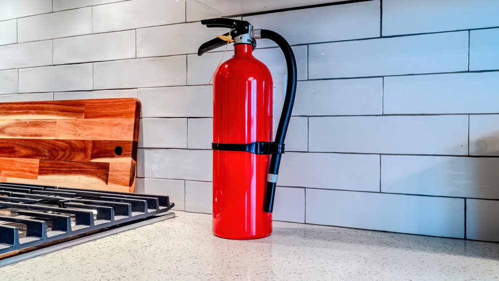 Fire extinguisher on kitchen countertop for bananas foster