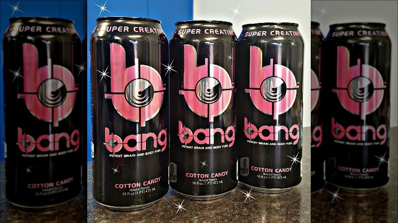 Cans of Bang Energy Cotton Candy flavor on counter