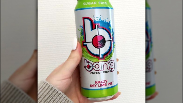 Someone holding can of Bang Energy Krazy Key Lime Pie