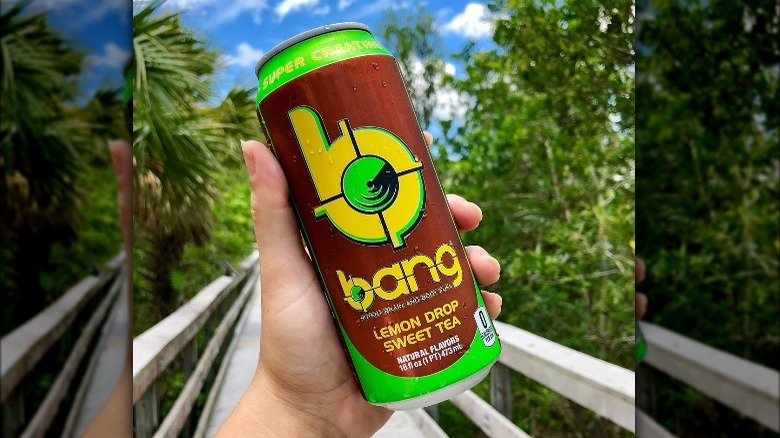 Someone holding can of Bang Energy Lemon Drop Sweet Tea