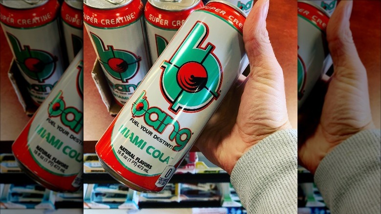 Someone holding can of Bang Energy Miami Cola