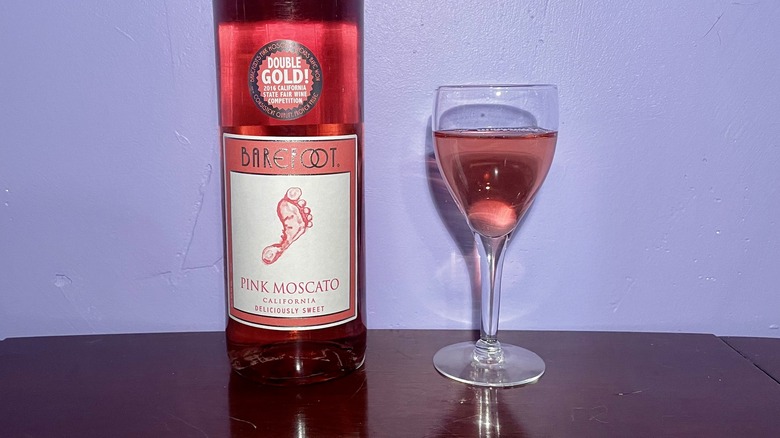 Bottle and glass of pink wine