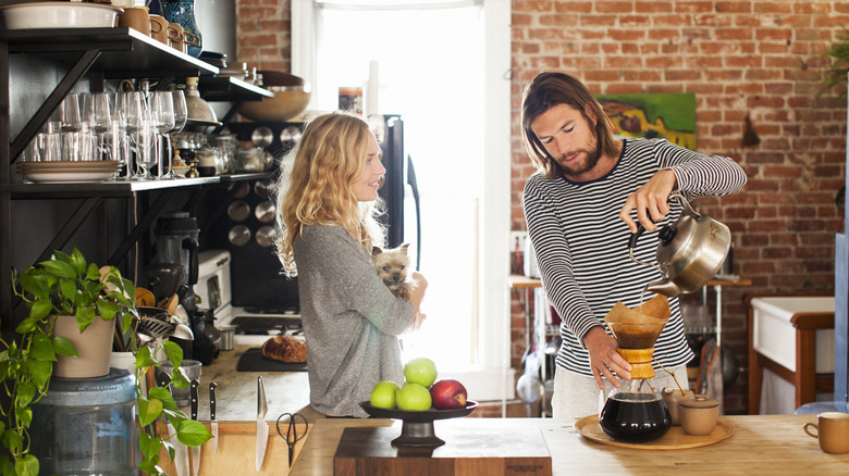 People preparing pour over coffee