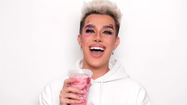 James Charles with pink drink