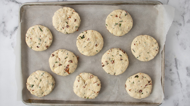 biscuit dough rounds on baking sheet