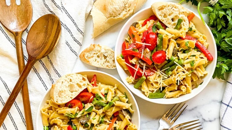 creamy pasta primavera with baguette