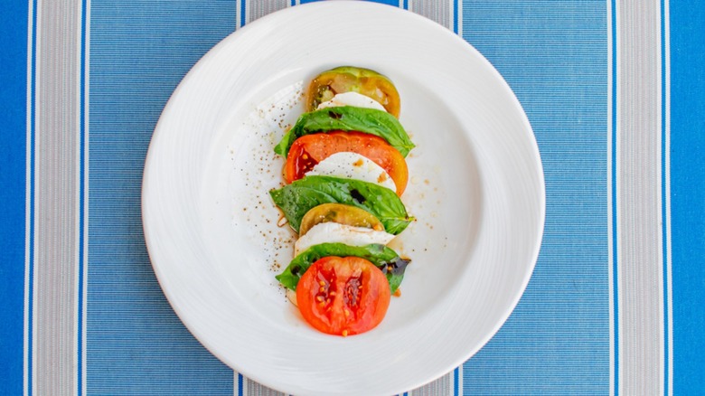 caprese salad on white plate