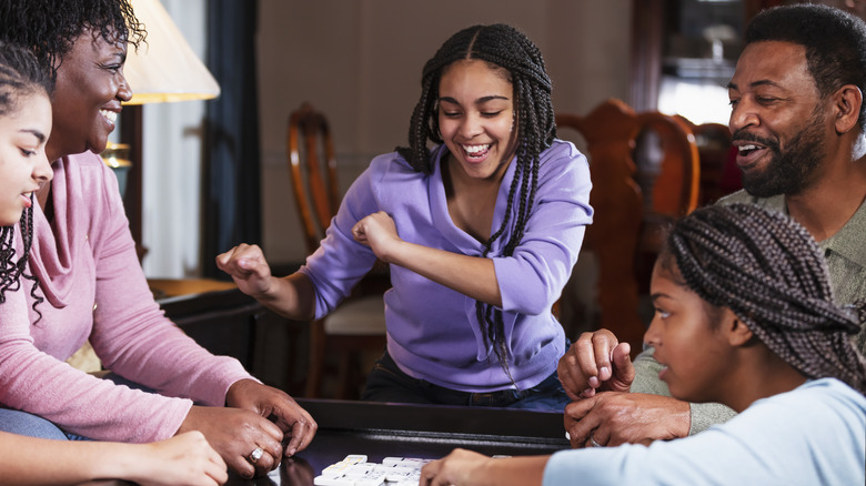 people playing board games