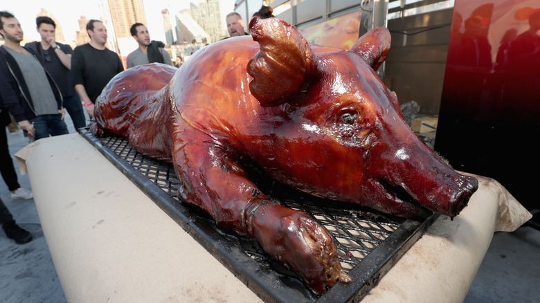 A suckling pig on a table