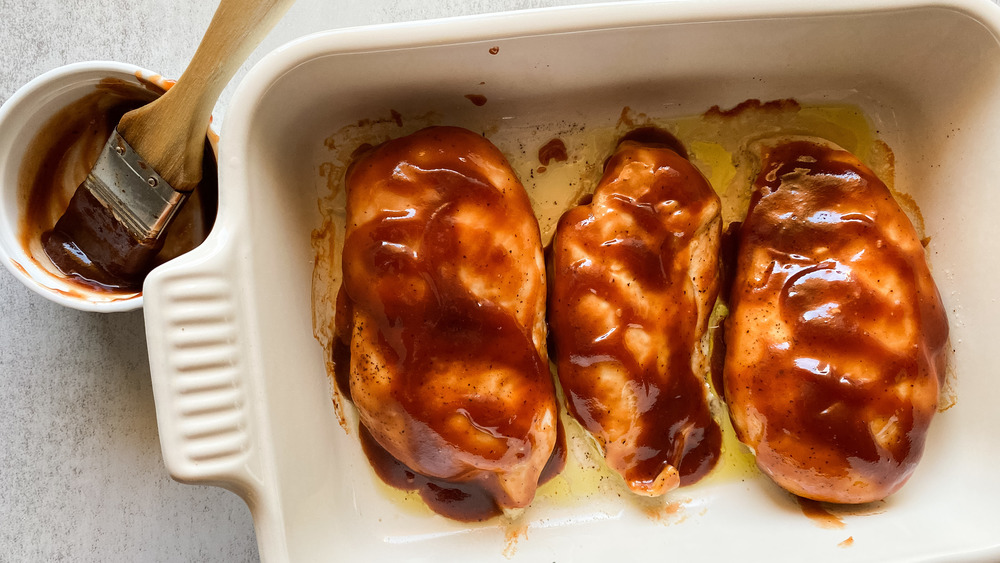 BBQ chicken recipe brushed with BBQ sauce