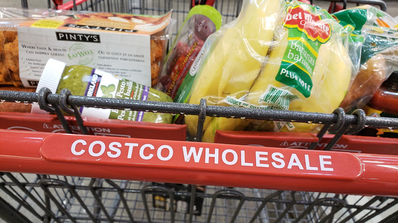 Costco shopping cart with bananas and other items