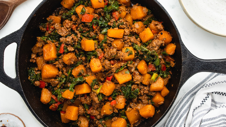 Beef and butternut squash in skillet