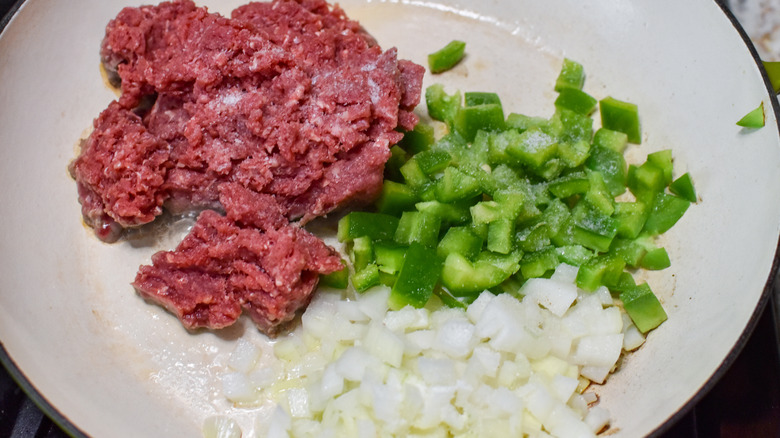 veggies and beef in skillet 