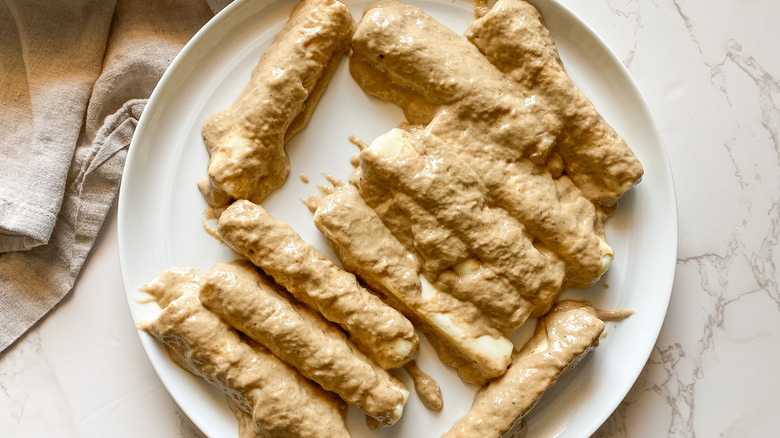 mozzarella sticks dipped in batter