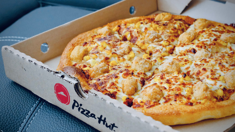 A Pizza Hut pizza in a box