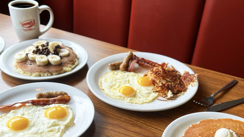 Breakfast foods on a table in a Denny's booth