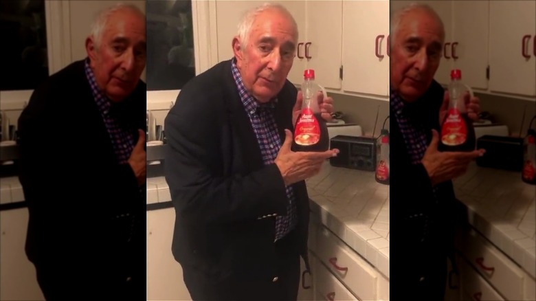 Ben Stein holding syrup