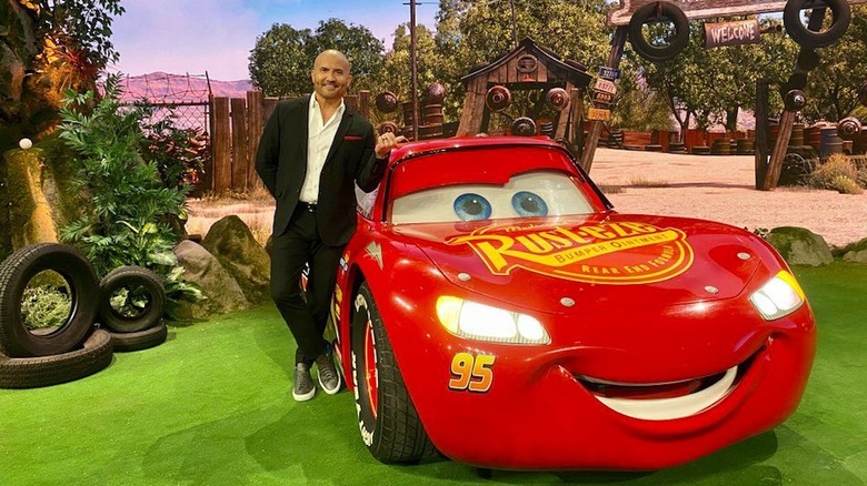 Chef and Foodtastic host Benny Rivera next to Lightning McQueen