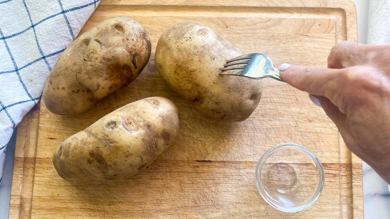 piercing baked potato