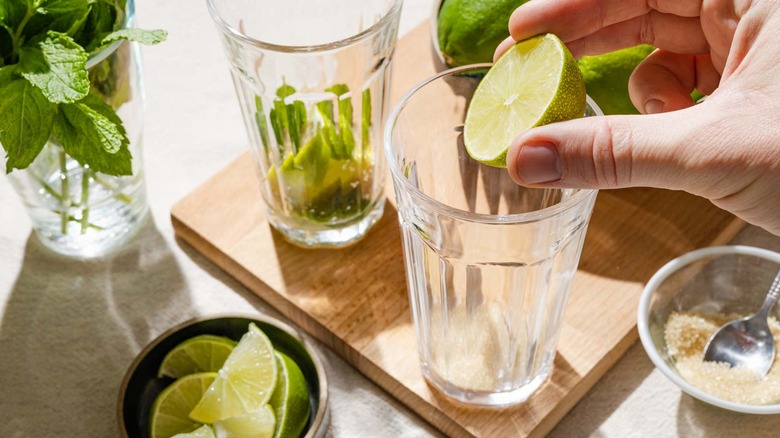 squeeze lime juice into glass