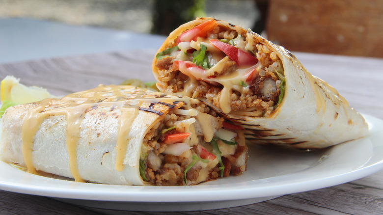 two burritos on plate