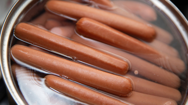 hot dogs in pot of water