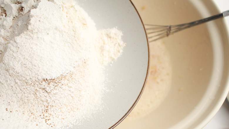 dry ingredients over egg yolk mixture