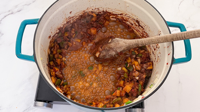 chili ingredients cooking in pot 