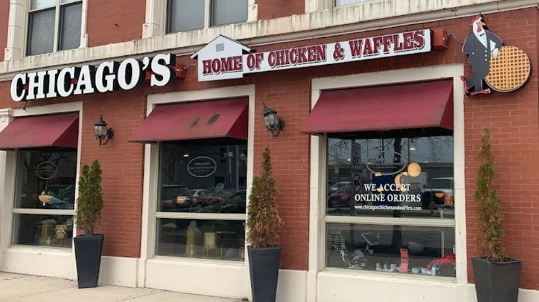 brick front and sign for Chicken and Waffles