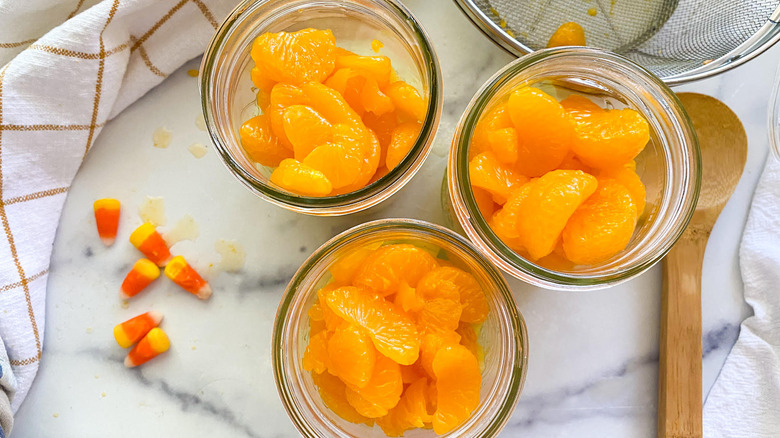 oranges in mason jar 