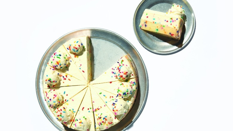 Confetti Cheesecake with a slice taken out