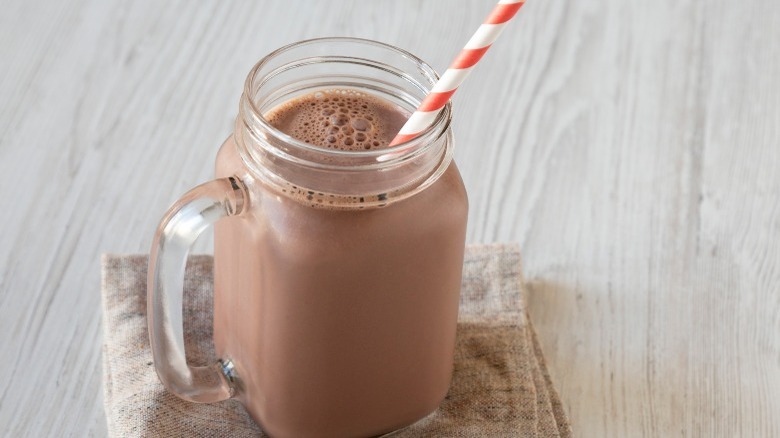 Chocolate milkshake with straw