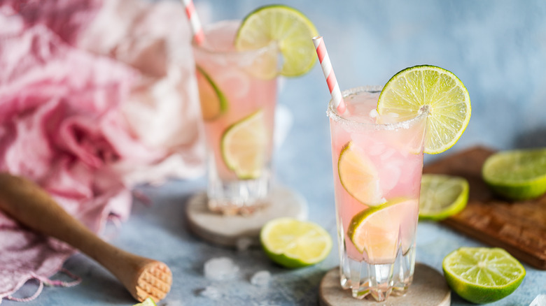 Paloma cocktail served with lime wheel