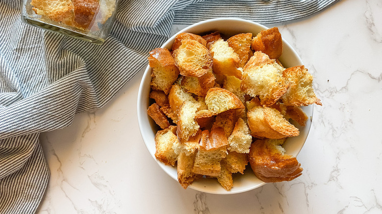 Croutons with crumpled striped towel