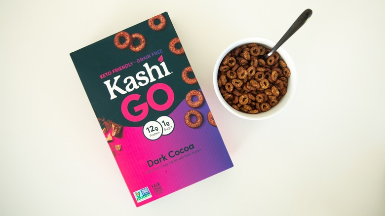 A black and purple cereal box with chocolate loops