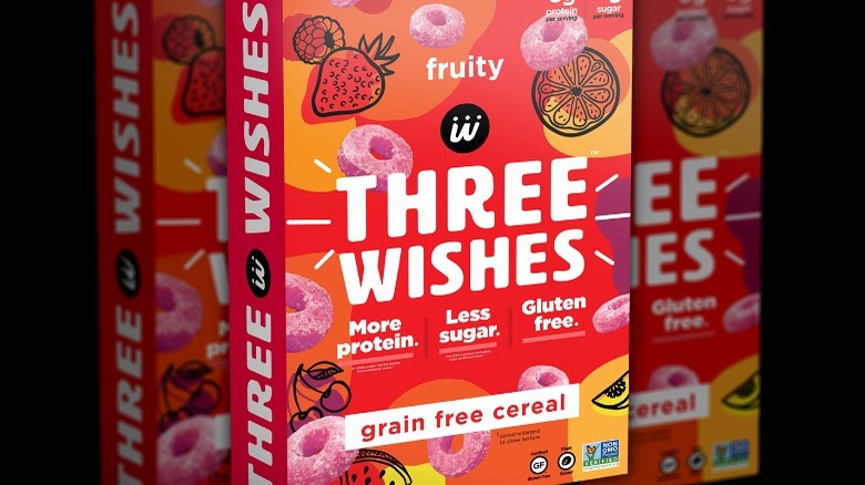 Orange, red and yellow box of purple cereal loops