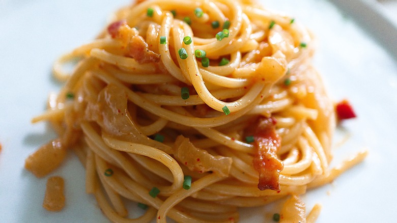 kimchi carbonara pasta on plate