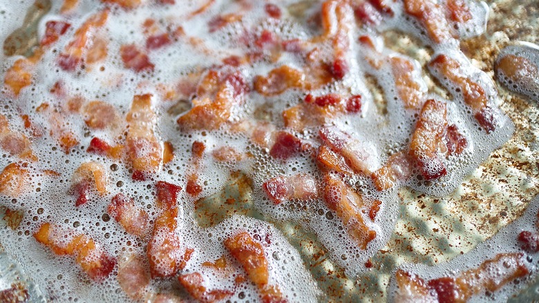 bacon cooking in grease