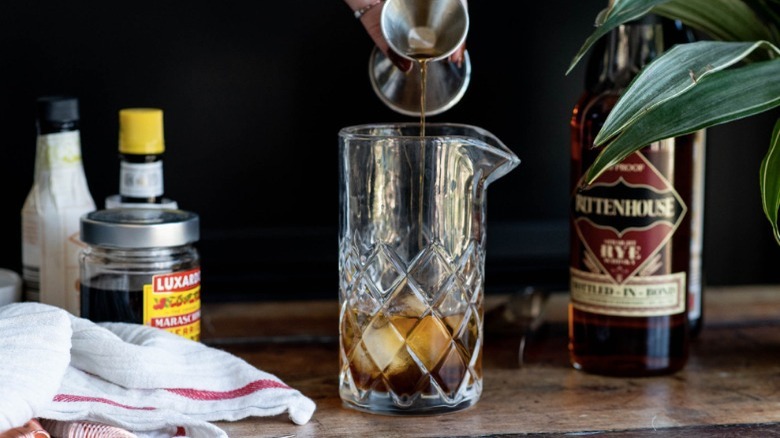 rye whiskey in mixing glass with ice