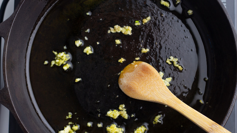 Best mixed greens recipe garlic cooking in skillet