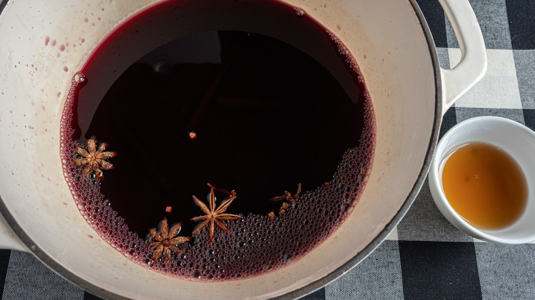 mixing mulled wine in pot