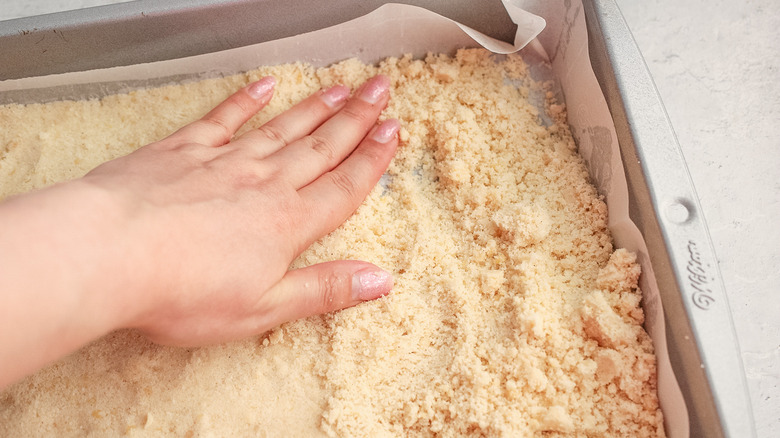 dough pressed in pan